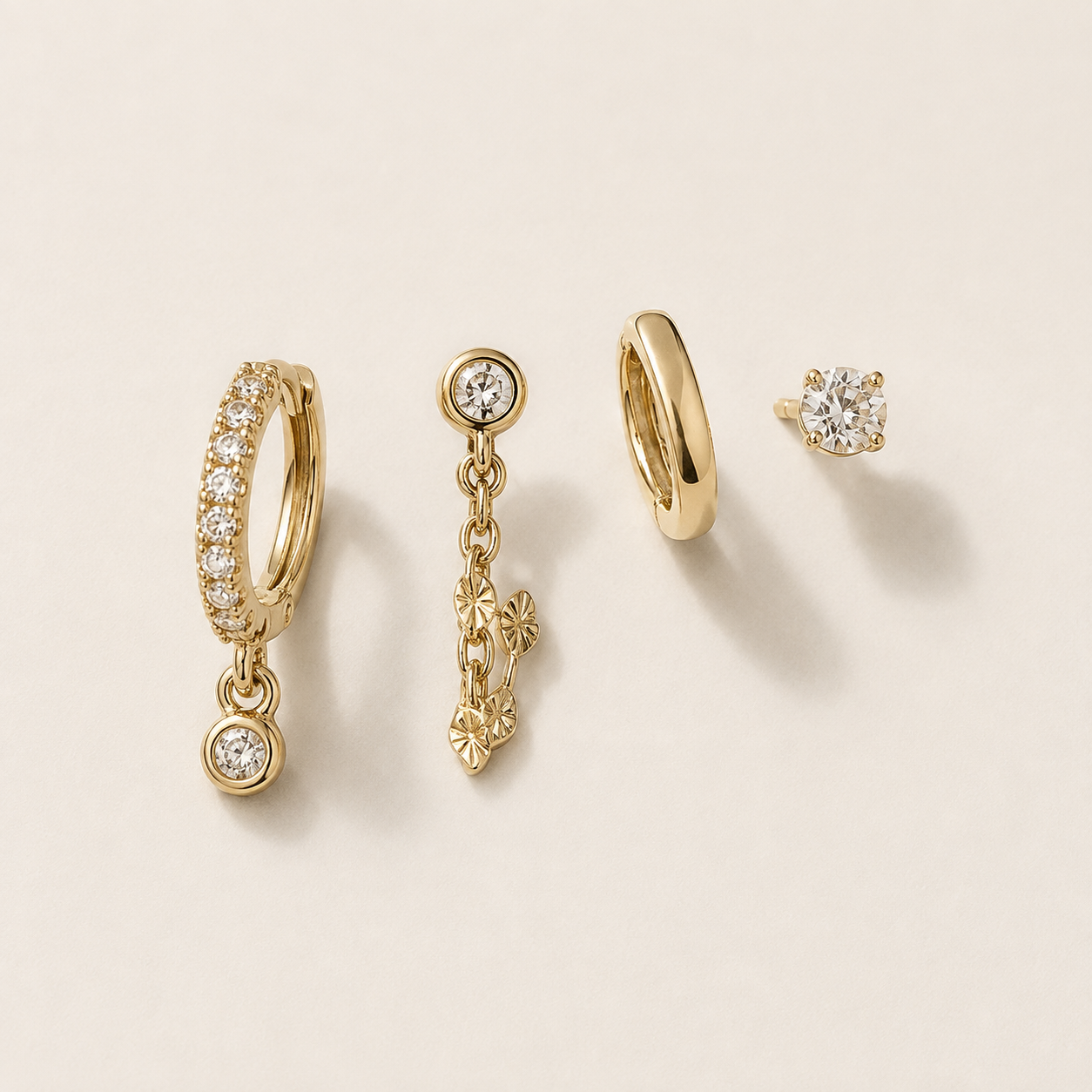 Golden Glow 4-Piece Curated Ear Stack Set – Crystal Huggie, Chain Drop, Hoop & Stud